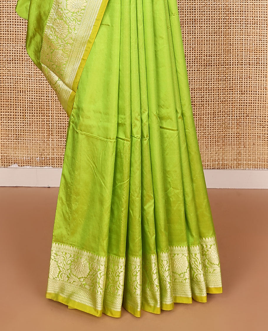 Parrot green buttas banarasi kathan silk saree, floral creeper border, and pallu of paisley jaal design