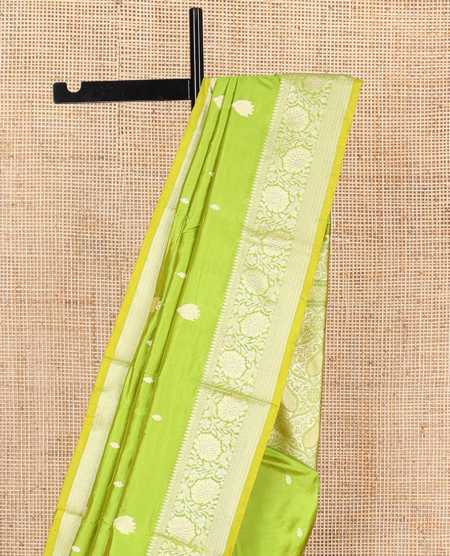 Parrot green buttas banarasi kathan silk saree, floral creeper border, and pallu of paisley jaal design