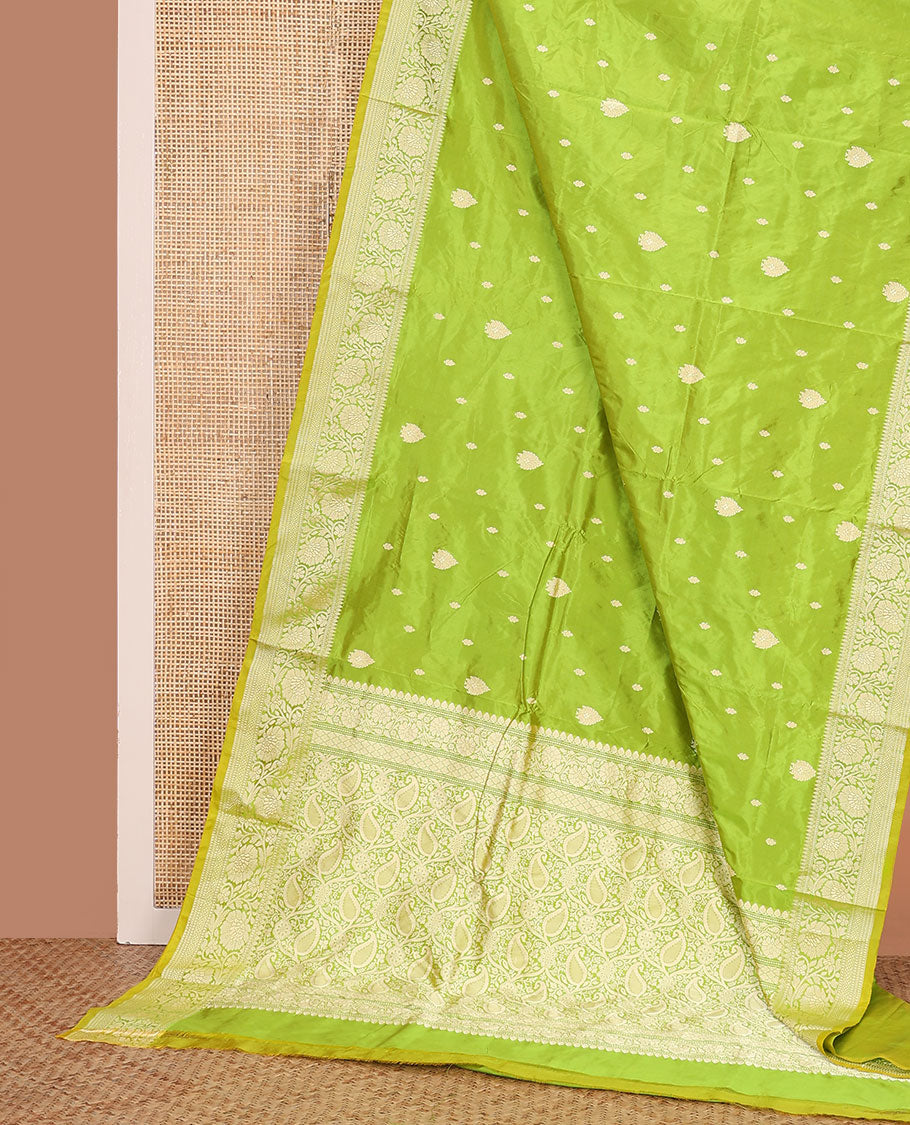 Parrot green buttas banarasi kathan silk saree, floral creeper border, and pallu of paisley jaal design