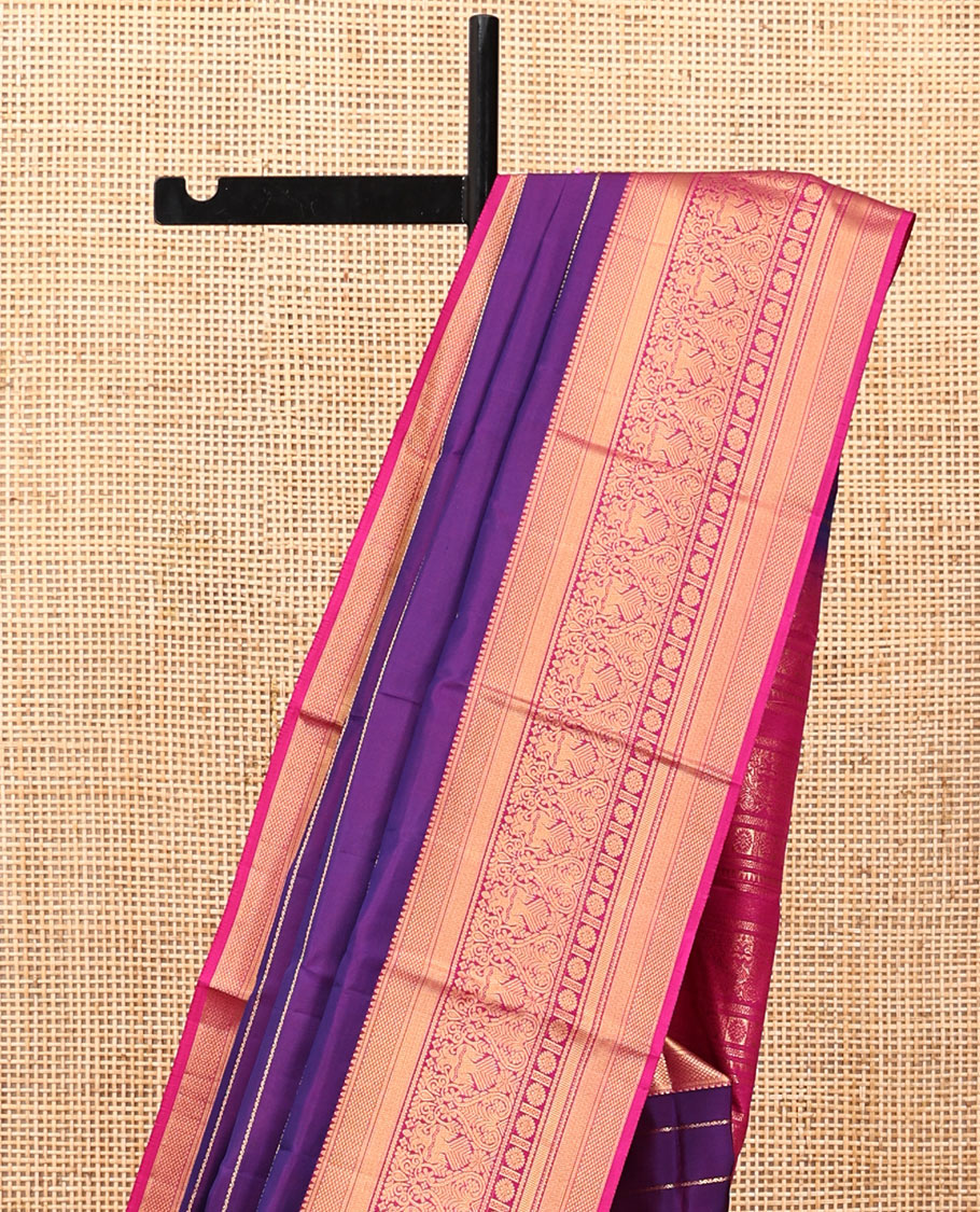 Purple Vasundhara Silk Saree, Enriched with Neli Stripes On Its Body, Complemented by Captivating Contrast Border of Mayil Kann, Vanki, Iru Thalaipakshi, Chakram, and Neli Designs, Grand Pallu, and Paired with a Contrast Blouse