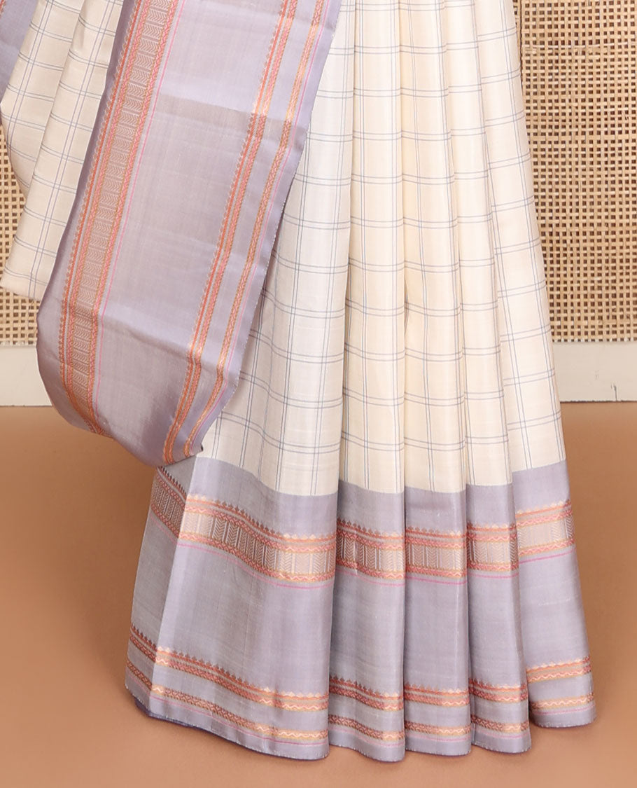 Pearl white checked Kanchipuram silksaree, contrast rettai pettu border of rekku,banaras,neli & kathir designs & pallu of seppu rekku