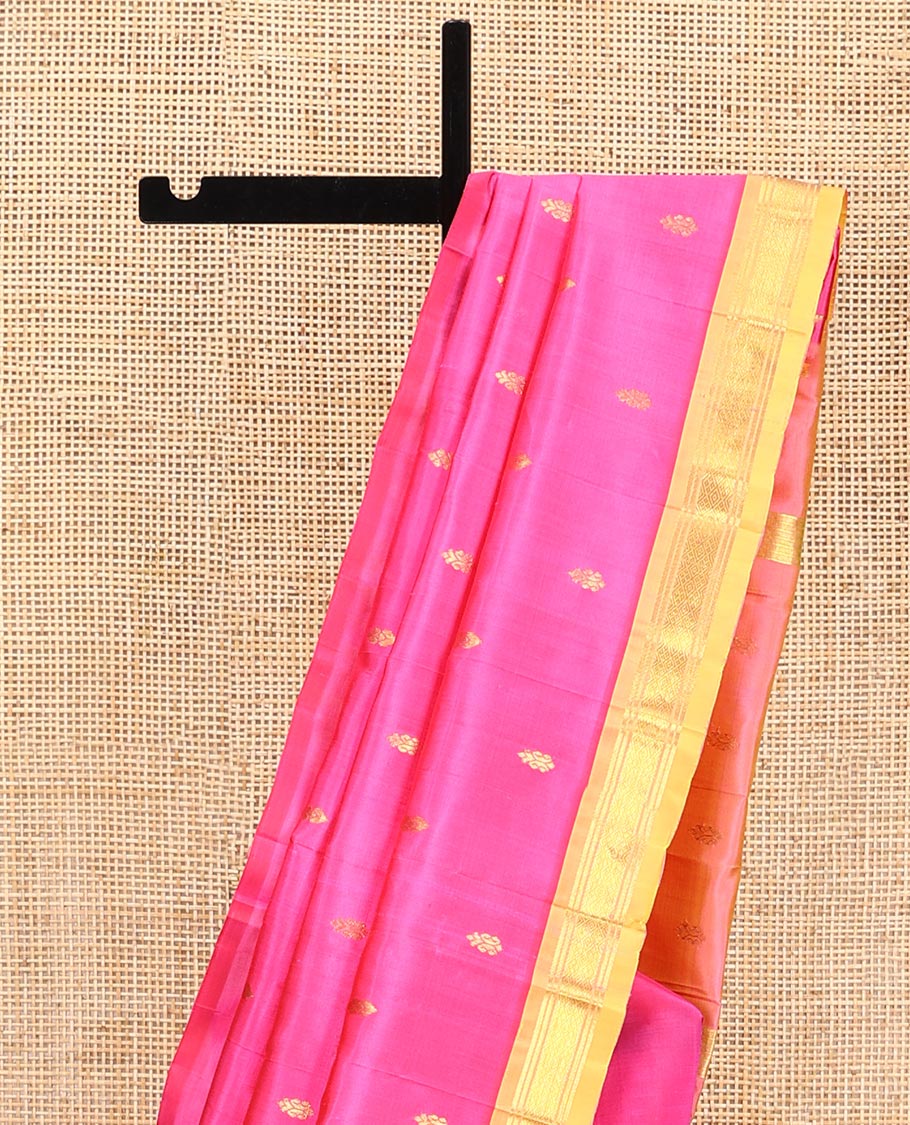 Pink Kanchipuram Silk Saree, Beautified with Zari Buttas All Over Its Body, Complemented by a Contrast One-Sided Border of Banaras, and Jaal Designs, Pallu of Zari Designs, and Comes Without a Blouse