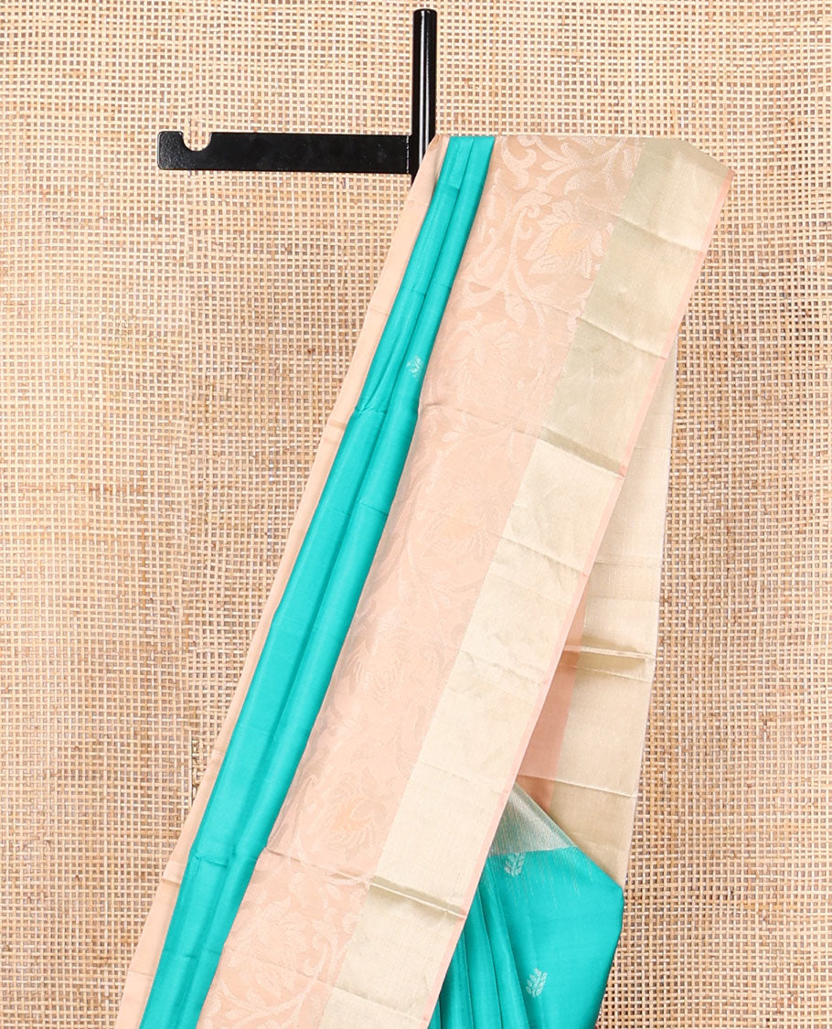 Light blue buttas mayuri soft silk saree with contrast floral border & floral design pallu