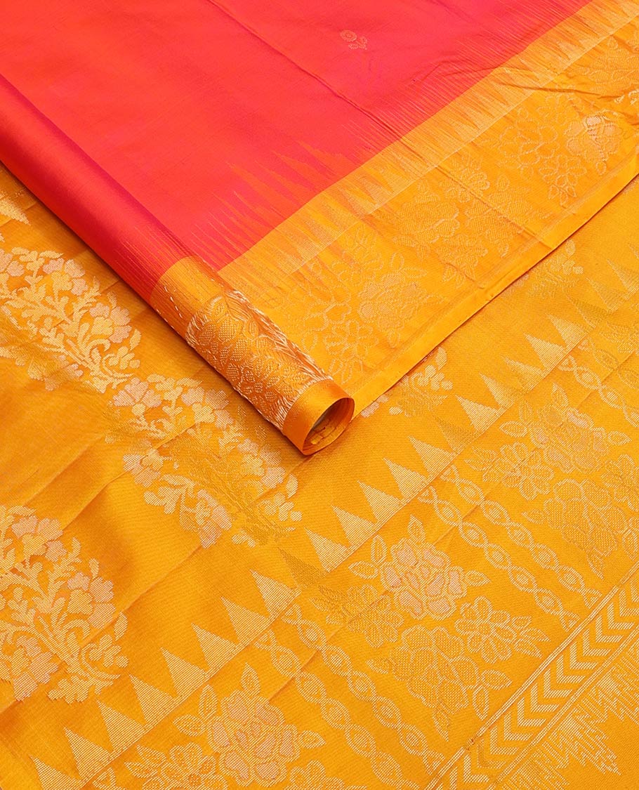 Red zari buttas soft silk saree, contrast temple border of floral designs, and floral design pallu