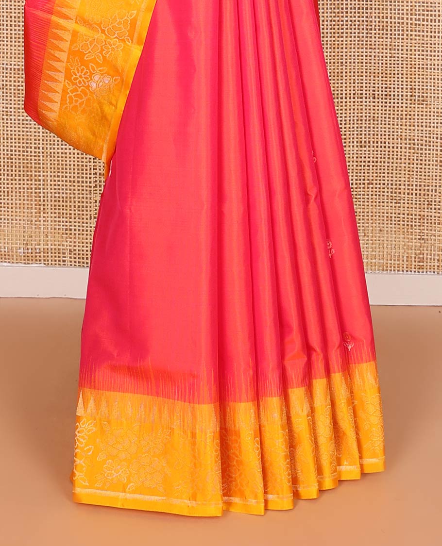 Red zari buttas soft silk saree, contrast temple border of floral designs, and floral design pallu