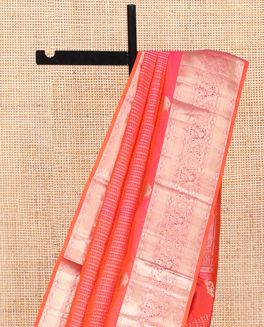 Rose and Orange Vasundhara Silk Saree, Majestically Detailed with Zari Buttas on Its Body, Highlighted by a Zari Border of Mayil, Diamond, and Vanki Designs, Richly Zari Detailed Pallu, and Paired with a Matching Blouse