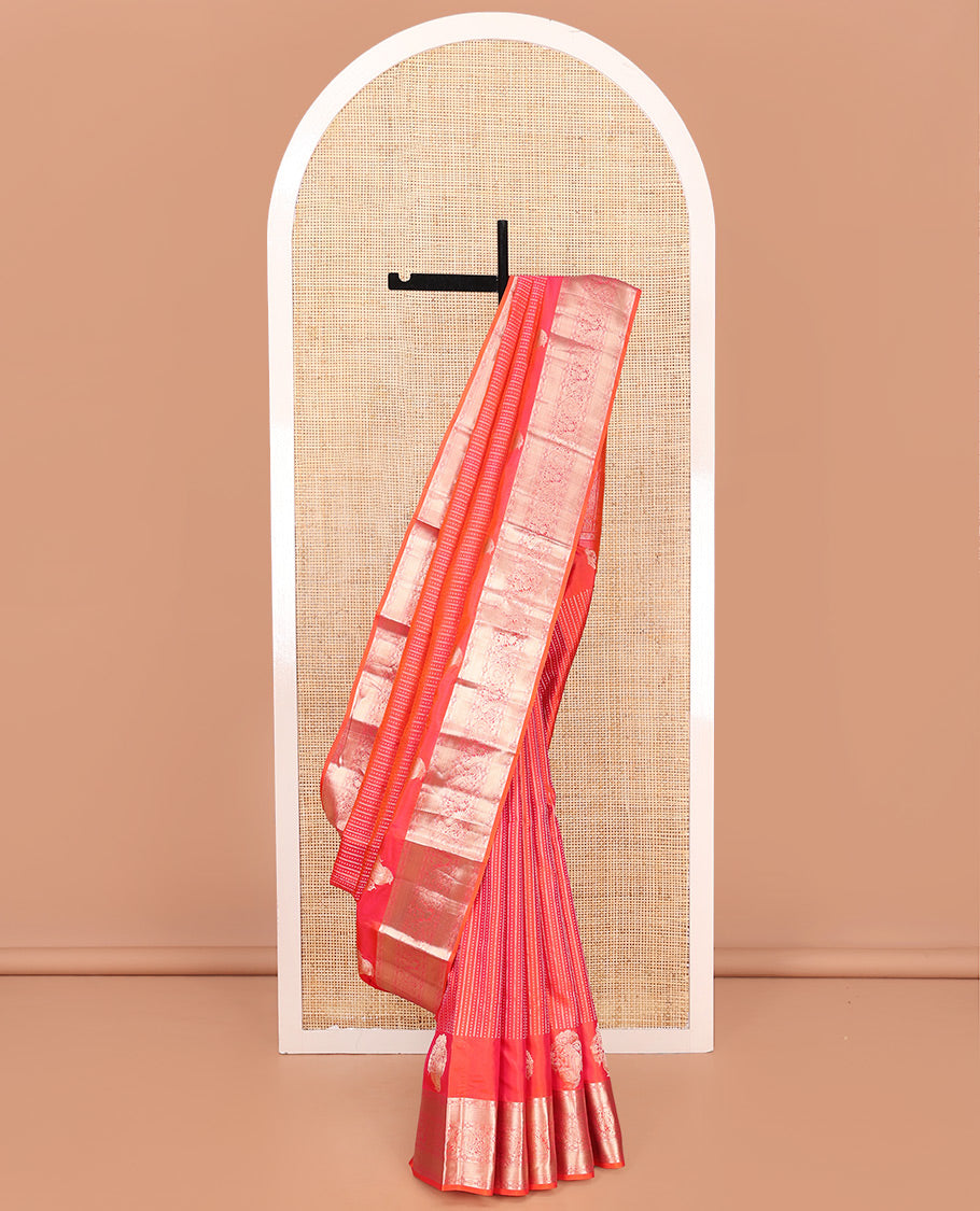 Rose and Orange Vasundhara Silk Saree, Majestically Detailed with Zari Buttas on Its Body, Highlighted by a Zari Border of Mayil, Diamond, and Vanki Designs, Richly Zari Detailed Pallu, and Paired with a Matching Blouse