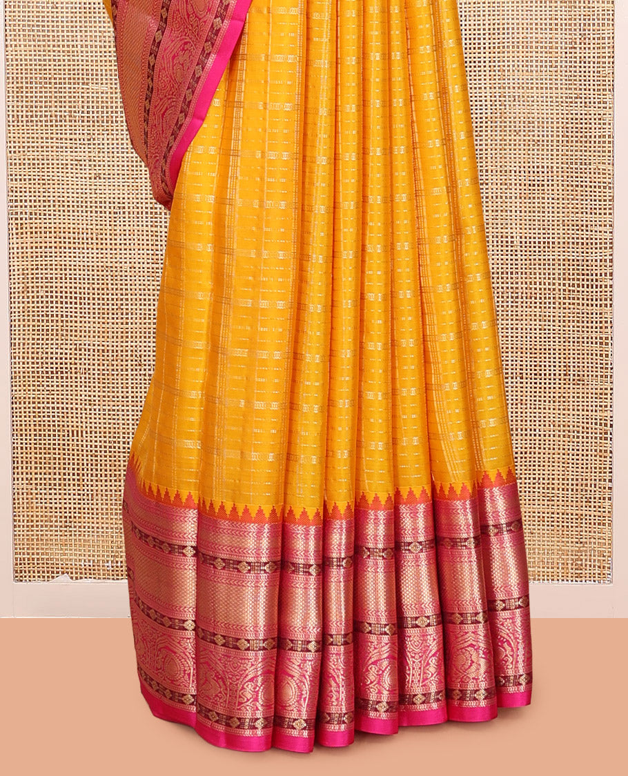 Yellow Vasundhara Silk Saree, Sparsely Threaded with Zari Checks, a Contrast Border of Kathir, Kuyil Kann, Manga, and Mayil Designs, Floral Design Pallu, and a Contrast Blouse