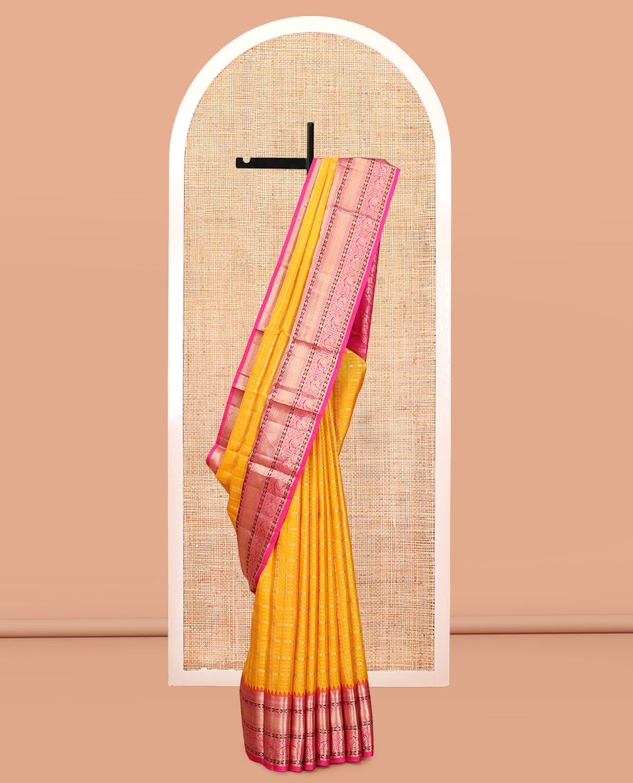 Yellow Vasundhara Silk Saree, Sparsely Threaded with Zari Checks, a Contrast Border of Kathir, Kuyil Kann, Manga, and Mayil Designs, Floral Design Pallu, and a Contrast Blouse