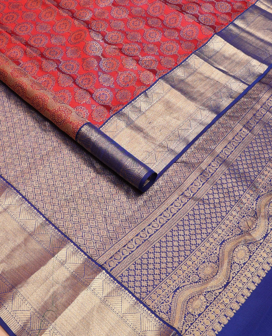 Red ajrakh-style jacquard wedding silk saree, contrast jaal pallu & border of geometric patterns