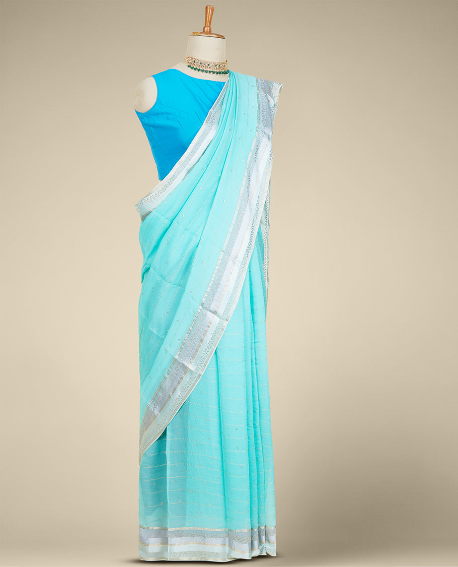 Blue striped pure chiffon saree with all-over micro stone embroidery, contrast border of micro stone work