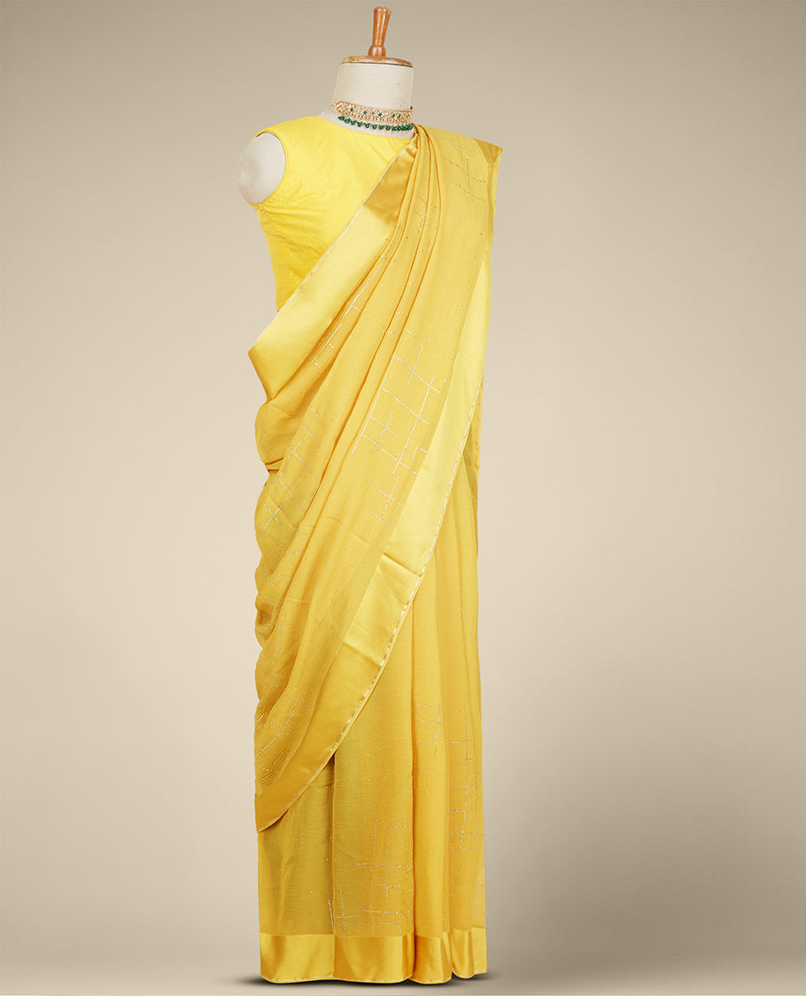 Mustard yellow embroidery pure chiffon saree with geometric patterns in micro stones, plain border