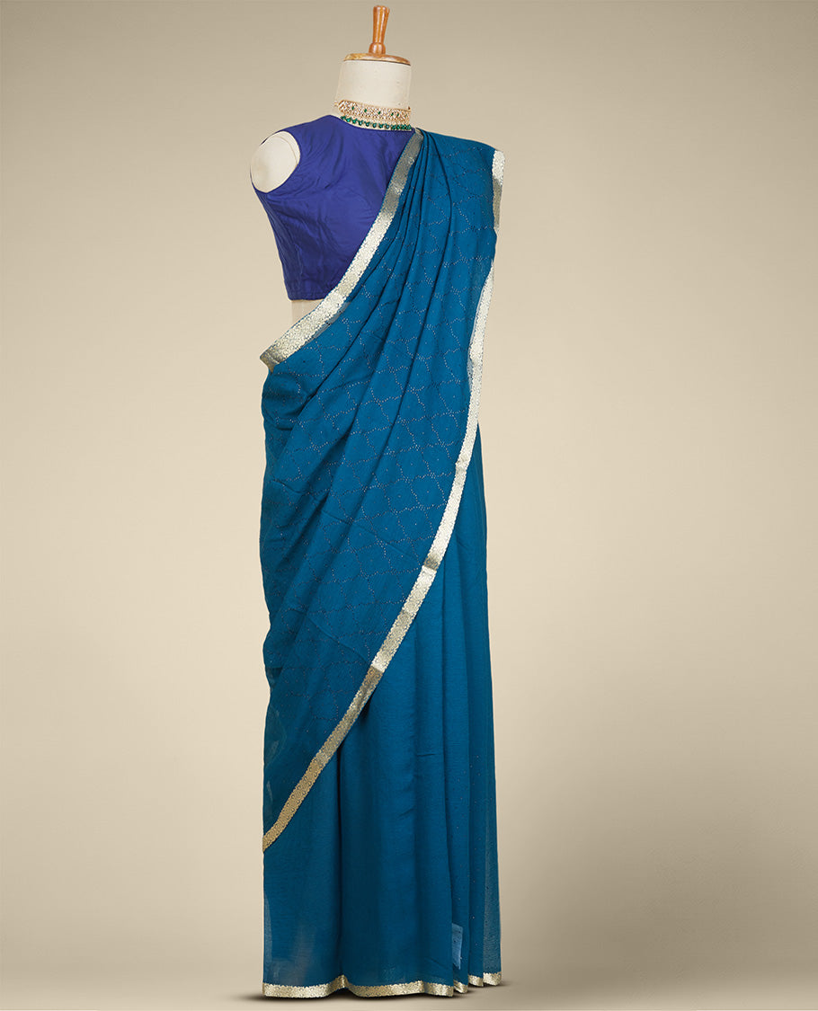 Blue embroidered pure chiffon saree with jaal patterned in micro stones, intricate border & pallu