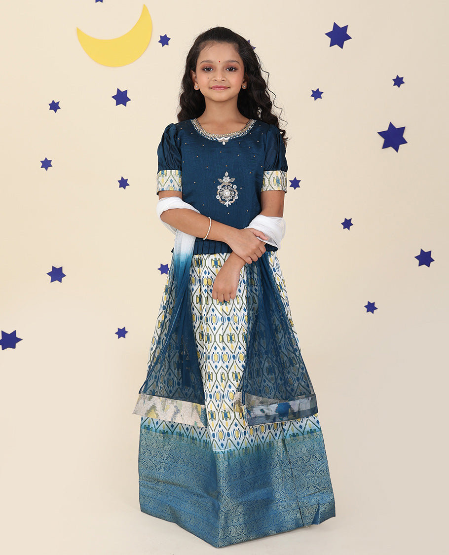 Cream cholly set features ogee printed & traditional border skirt, contrast embroidered puff-sleeve blouse & net dupatta