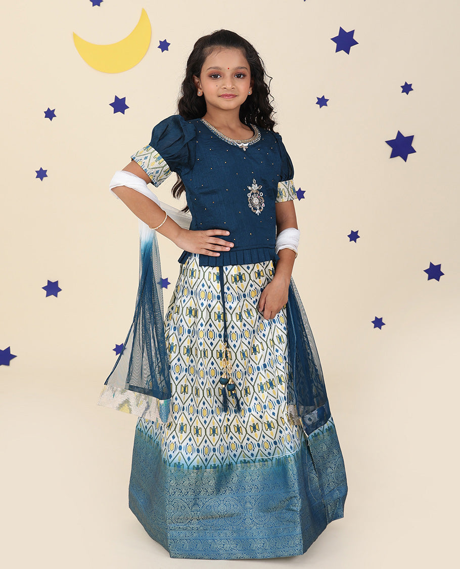 Cream cholly set features ogee printed & traditional border skirt, contrast embroidered puff-sleeve blouse & net dupatta