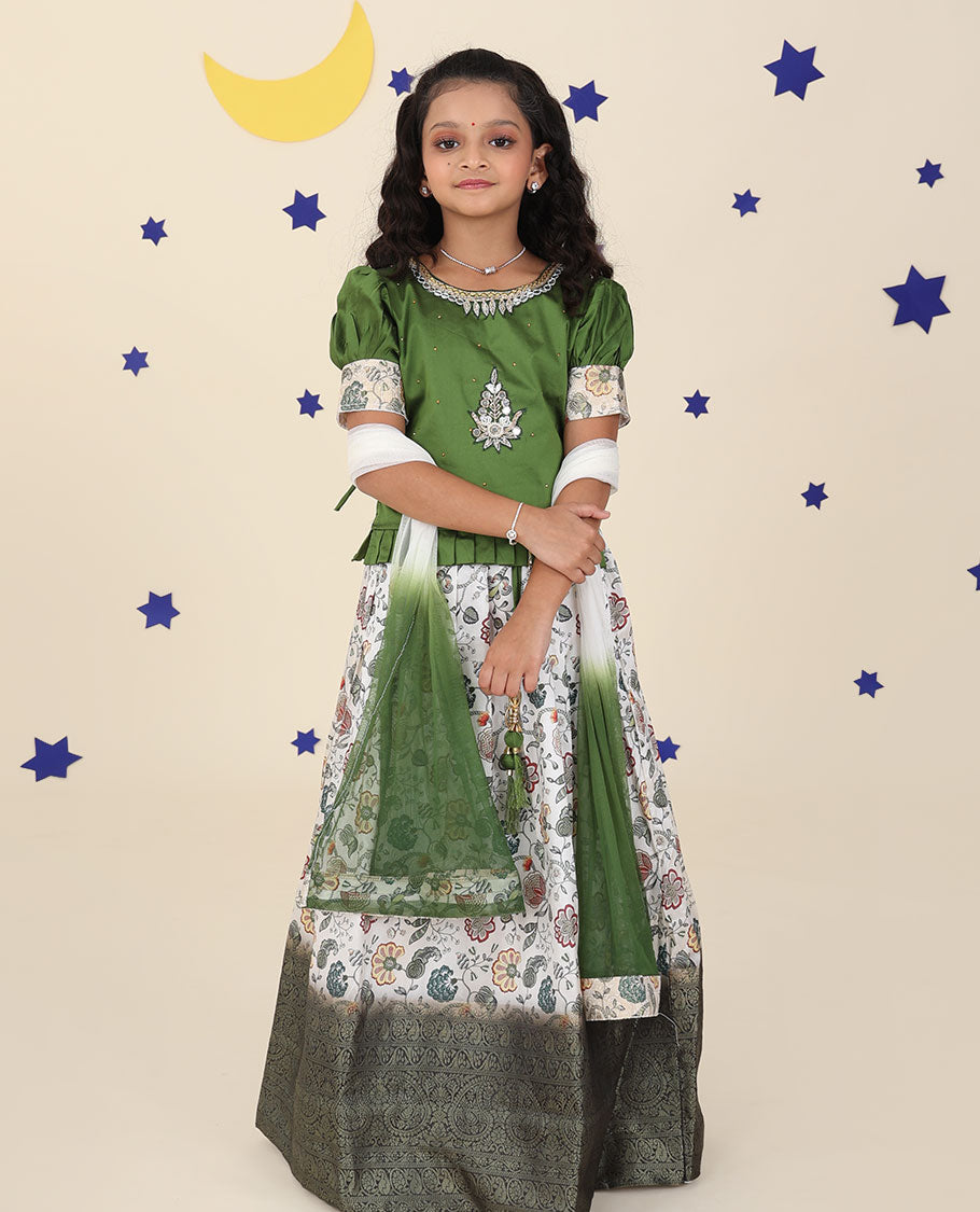 White cholly set features floral vine printed & traditional border skirt, embroidered puff-sleeve blouse & net dupatta
