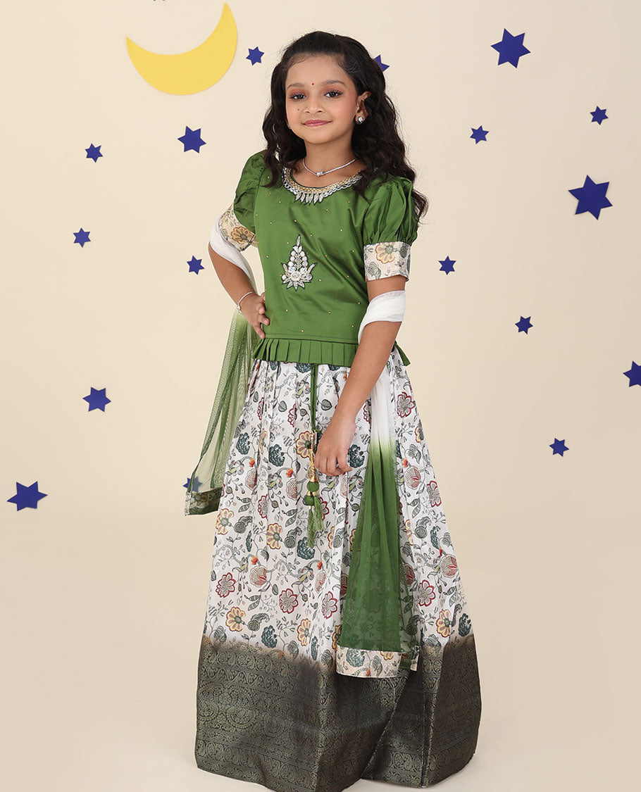 White cholly set features floral vine printed & traditional border skirt, embroidered puff-sleeve blouse & net dupatta