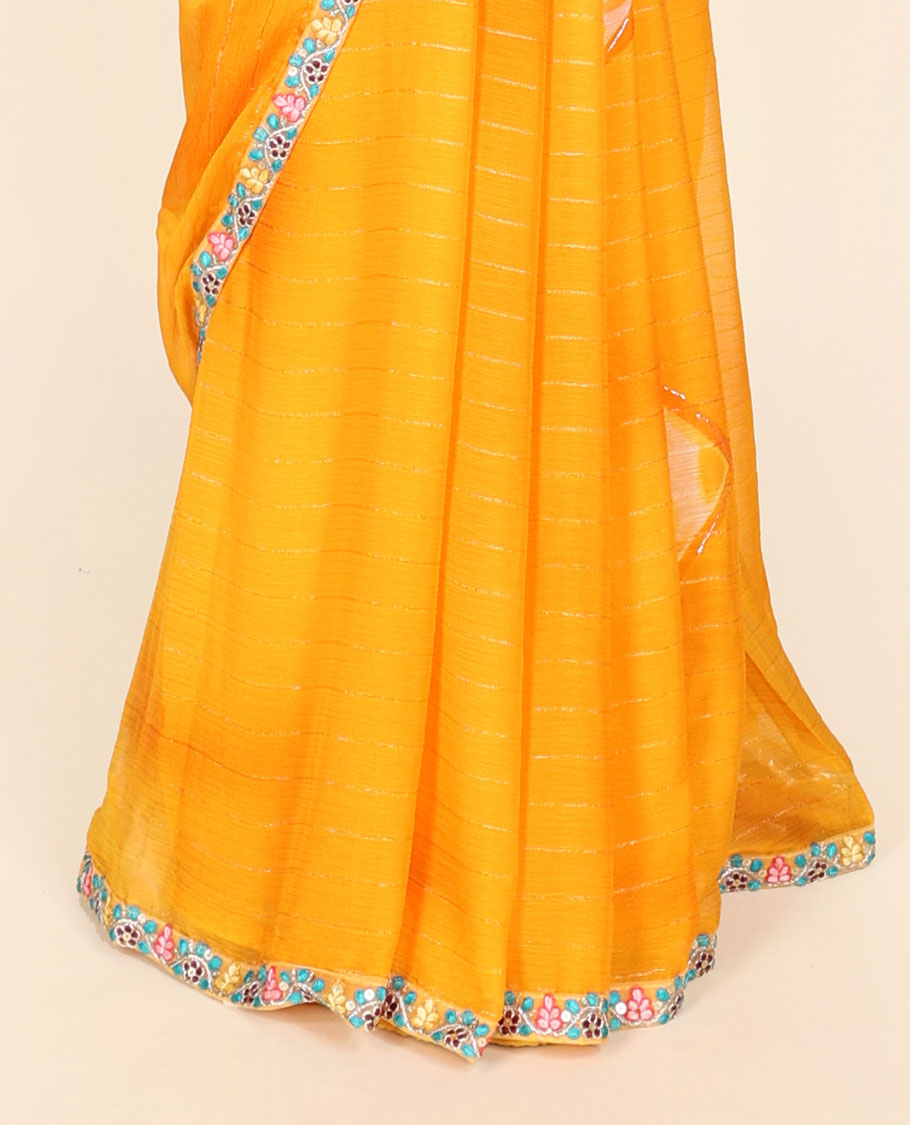 Yellow casual wear saree with stripes & buttas, floral creeper embroidered patchwork border