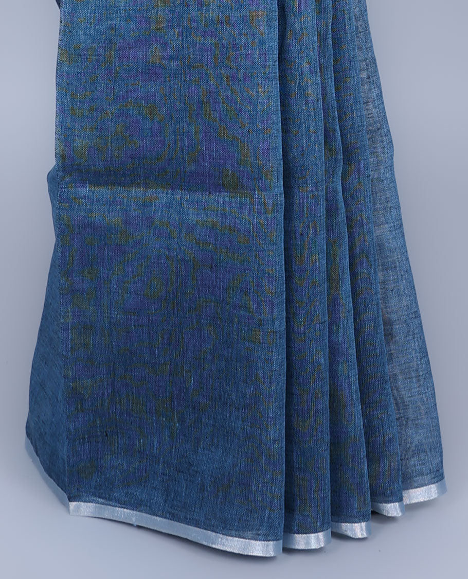 Borderless blue thread embroidered linen saree features floral motifs, pallu of sequin stripes