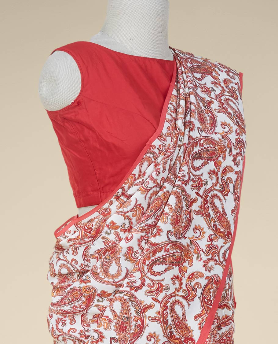 Borderless cream intricate paisley motifs printed fancy crepe saree