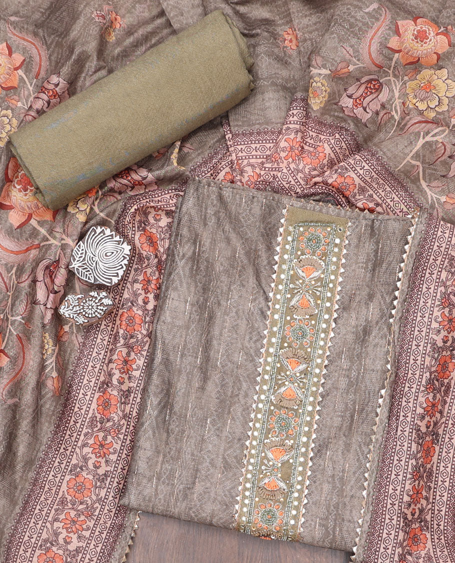 Green material chudidhar,intricate print & embroidery tissue top,plain santoon bottom & floral design chanderi dupatta