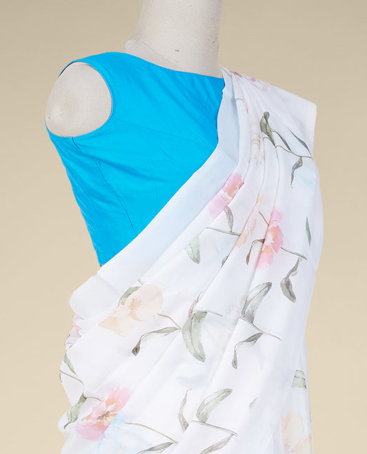White printed semi banaras crepe saree accentuated with multi-color floral motifs