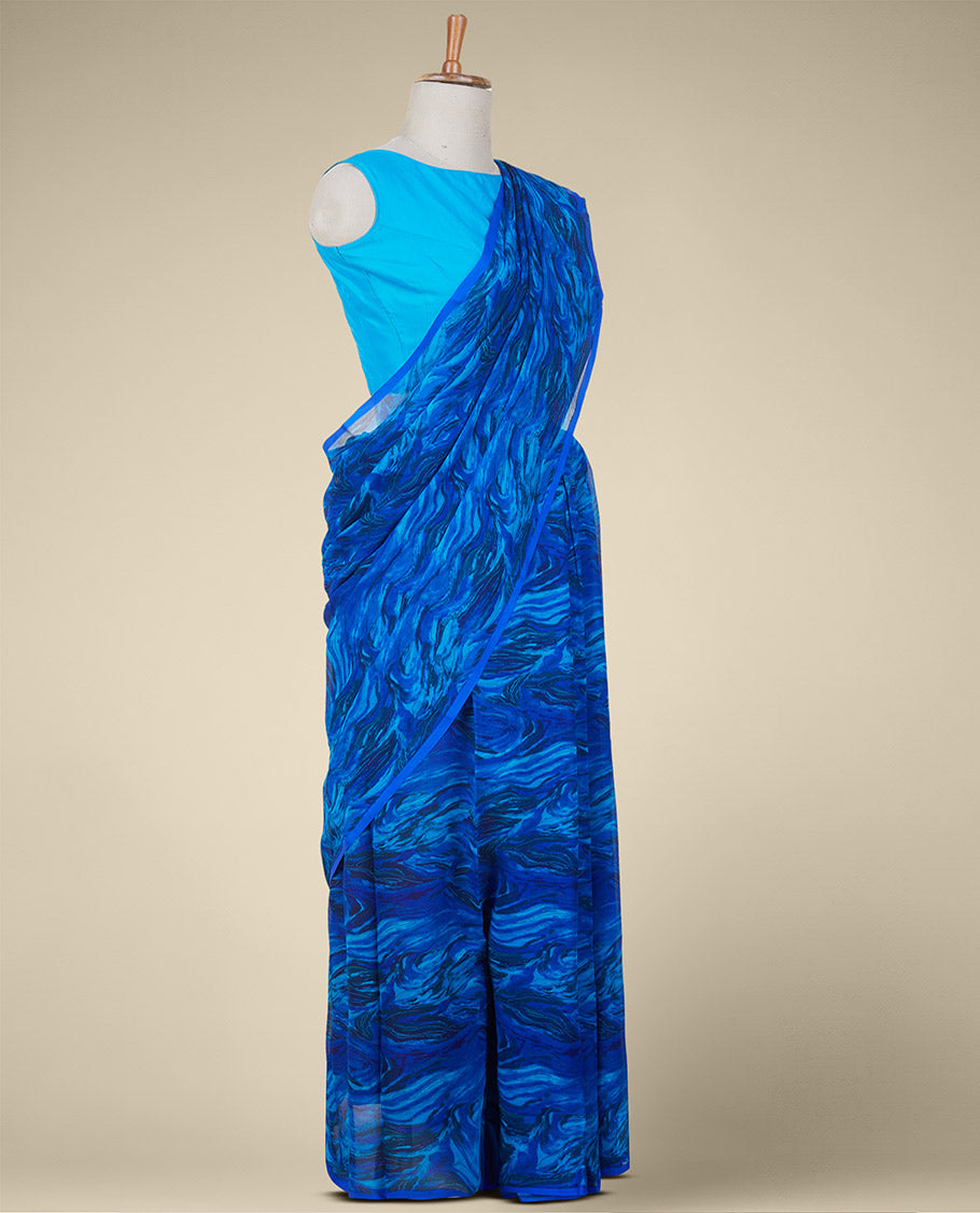 Borderless blue abstract-style printed pure chiffon saree