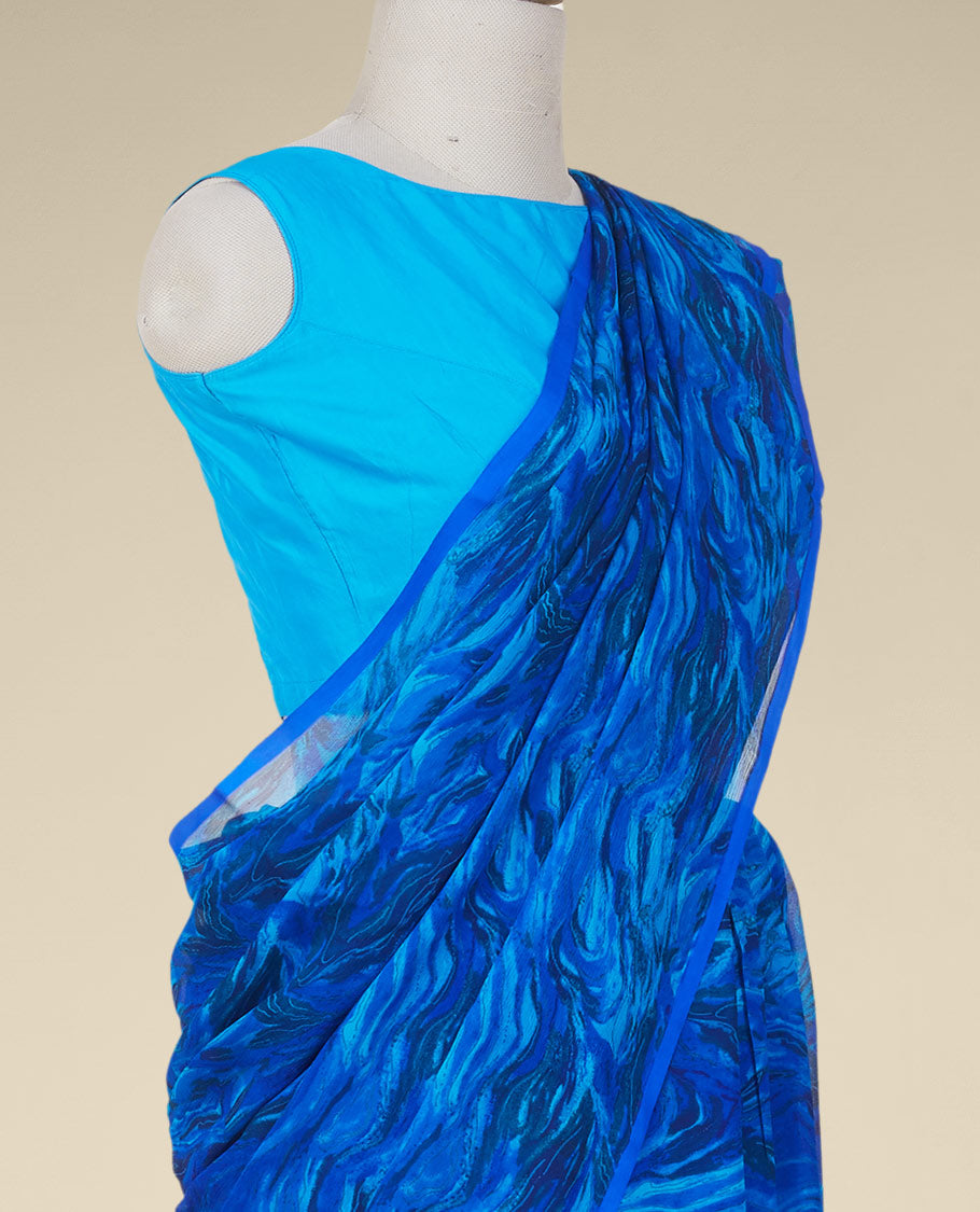 Borderless blue abstract-style printed pure chiffon saree