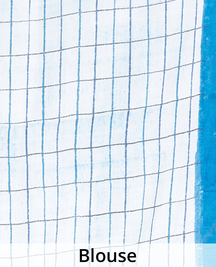 Blue printed silk saree stepped with polka dots, a plain border