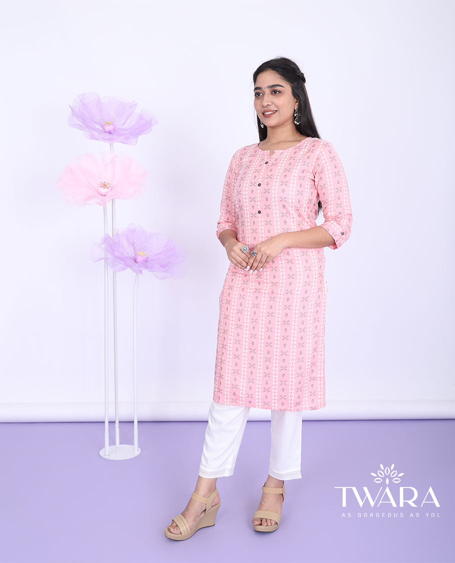 Pink unique motifs printed round neck with 3/4th sleeve rayon straight-cut below-knee kurti