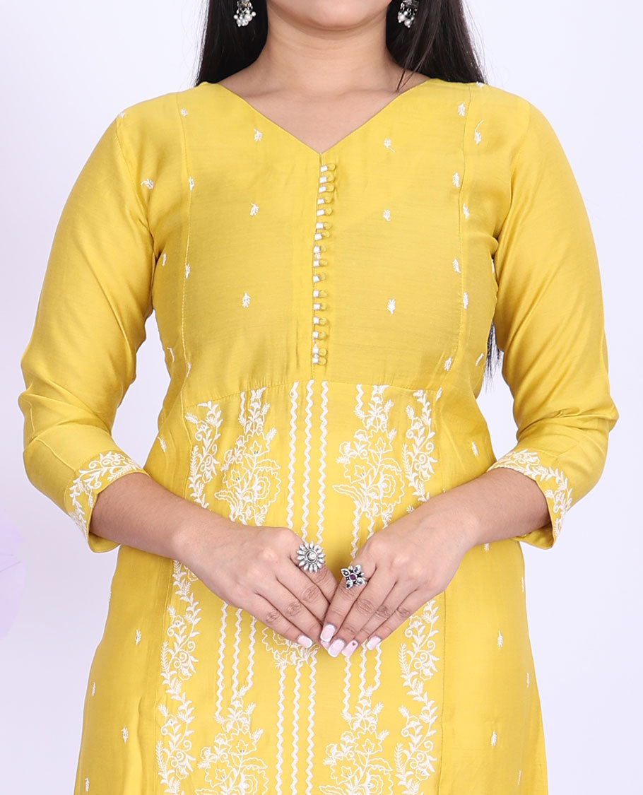 Twara yellow floral designs thread embroidered round neck with 3/4th sleeve silk cotton a-line calf-length kurti