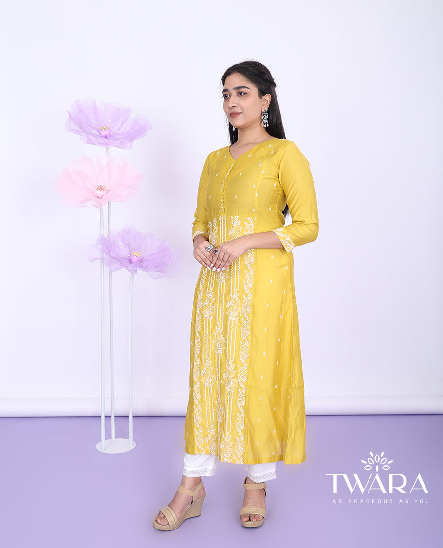 Twara yellow floral designs thread embroidered round neck with 3/4th sleeve silk cotton a-line calf-length kurti