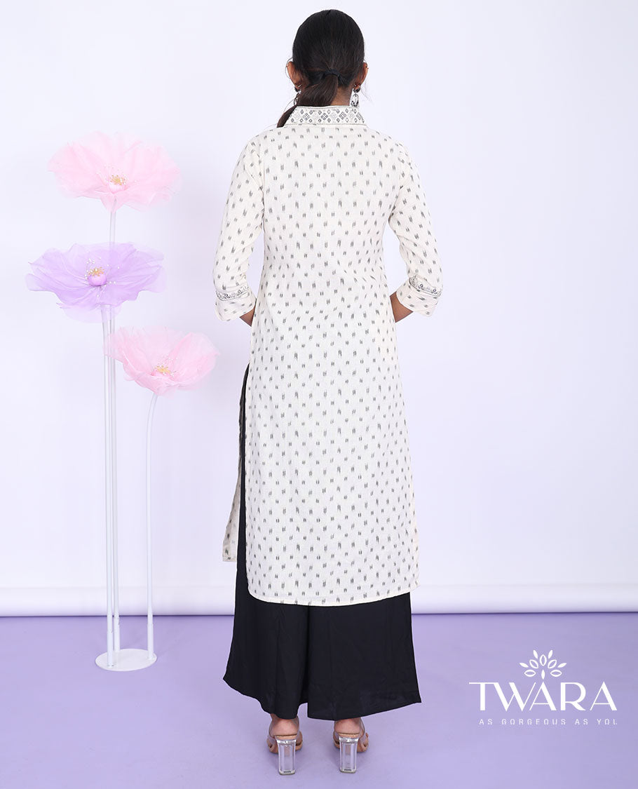 Twara cream unique motifs & embroidered v-neck with 3/4th sleeve cotton straight-cut below-knee kurti