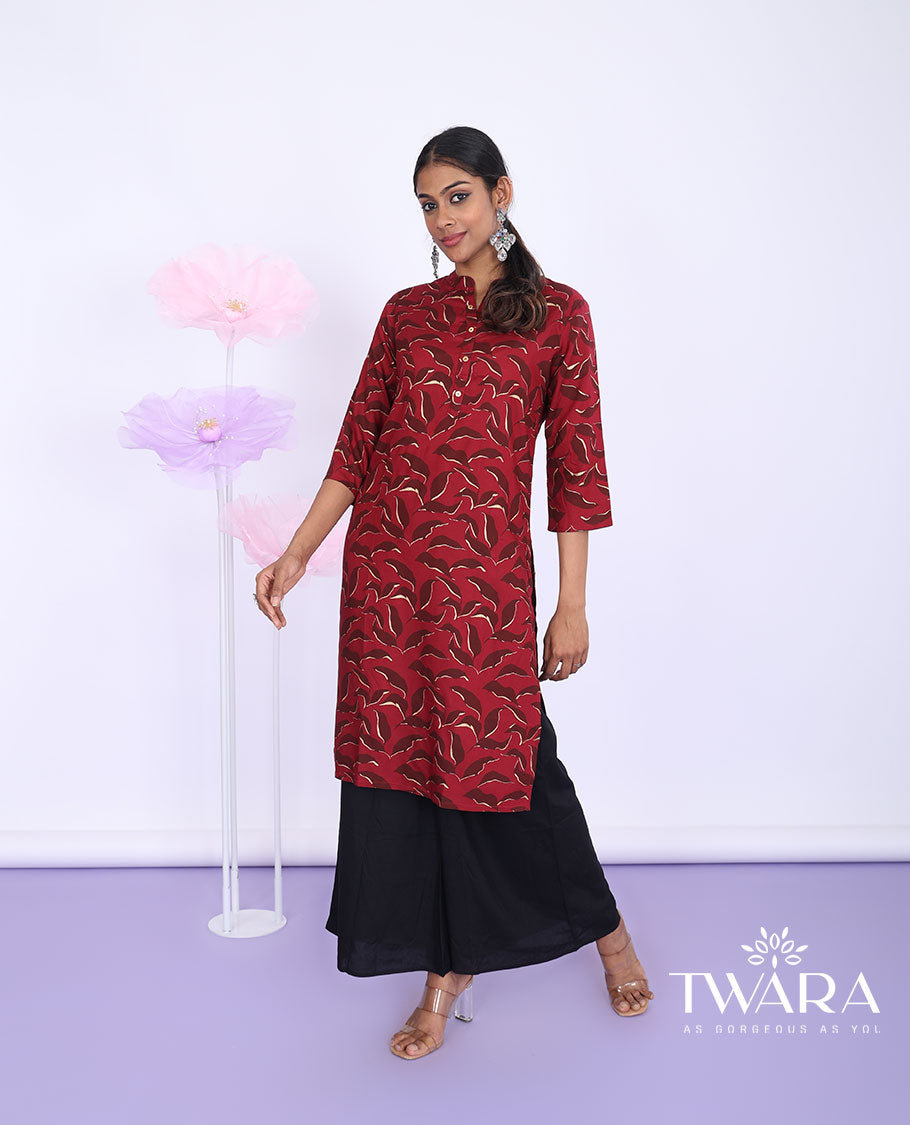 Twara red uniquely printed Chinese collar with 3/4th sleeve rayon straight-cut below-knee kurti
