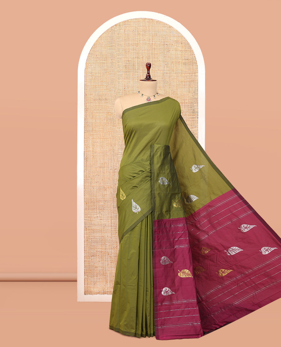 Borderless Green Leaf Buttas Arani Saree, a Contrast Pallu of Zari Stripes and Buttas, and a Contrast Blouse