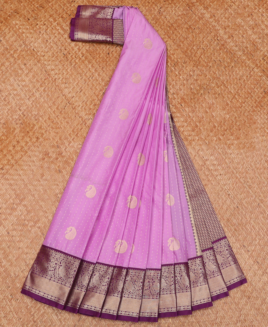 Pink Budget Silk Saree Artfully Detailed with Small Buttas and Paisley Buttas, Complemented by a Contrast Traditional Zari Motif Border, Adorned with Pallu of Intricate Designs, and Paired with a Contrast Blouse