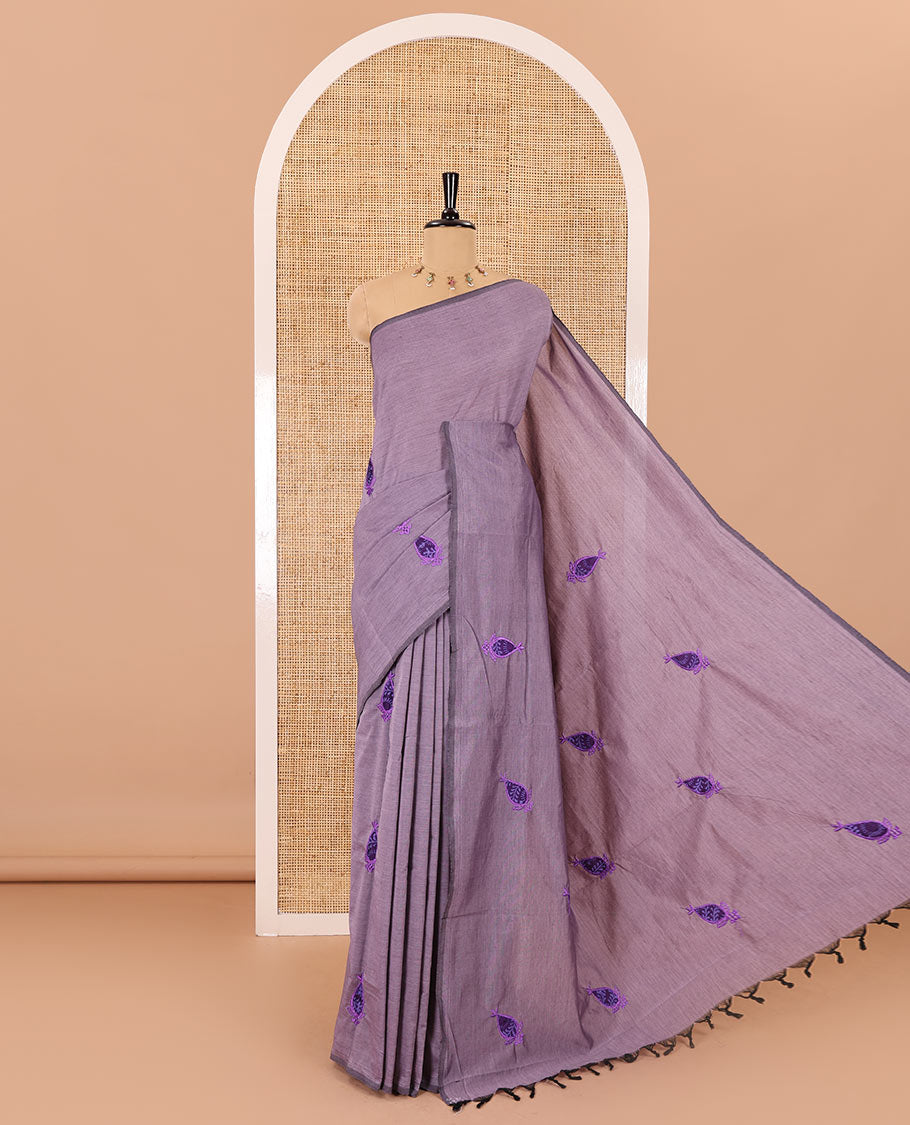 Borderless light lavender thilakam motifs patch embroidered South cotton saree with a plain blouse and a contrast ogee patterns printed blouse