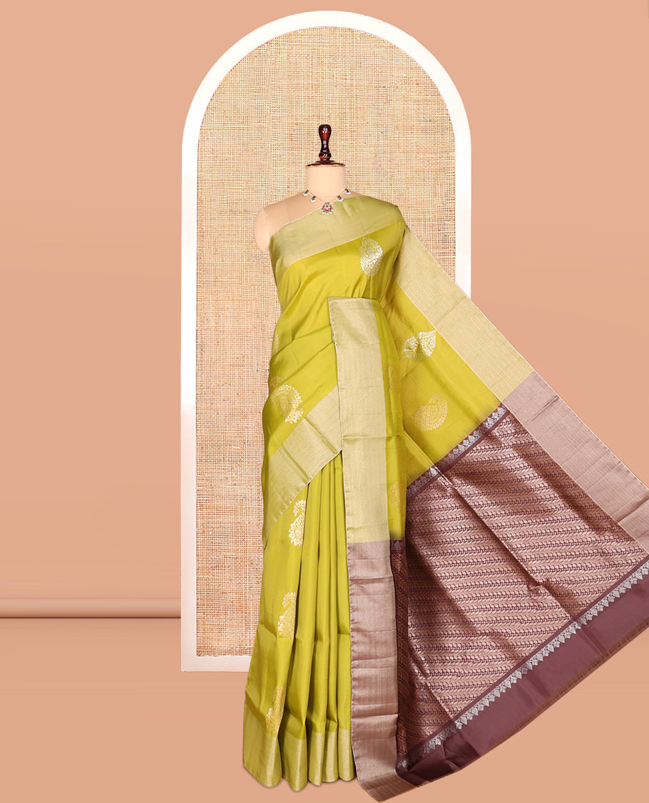 Green Semi Uppada Saree, Embellished with Zari Buttas, a Bavanji Border, Contrast Diagonal Leaf Vine Pallu, and a Contrast Blouse