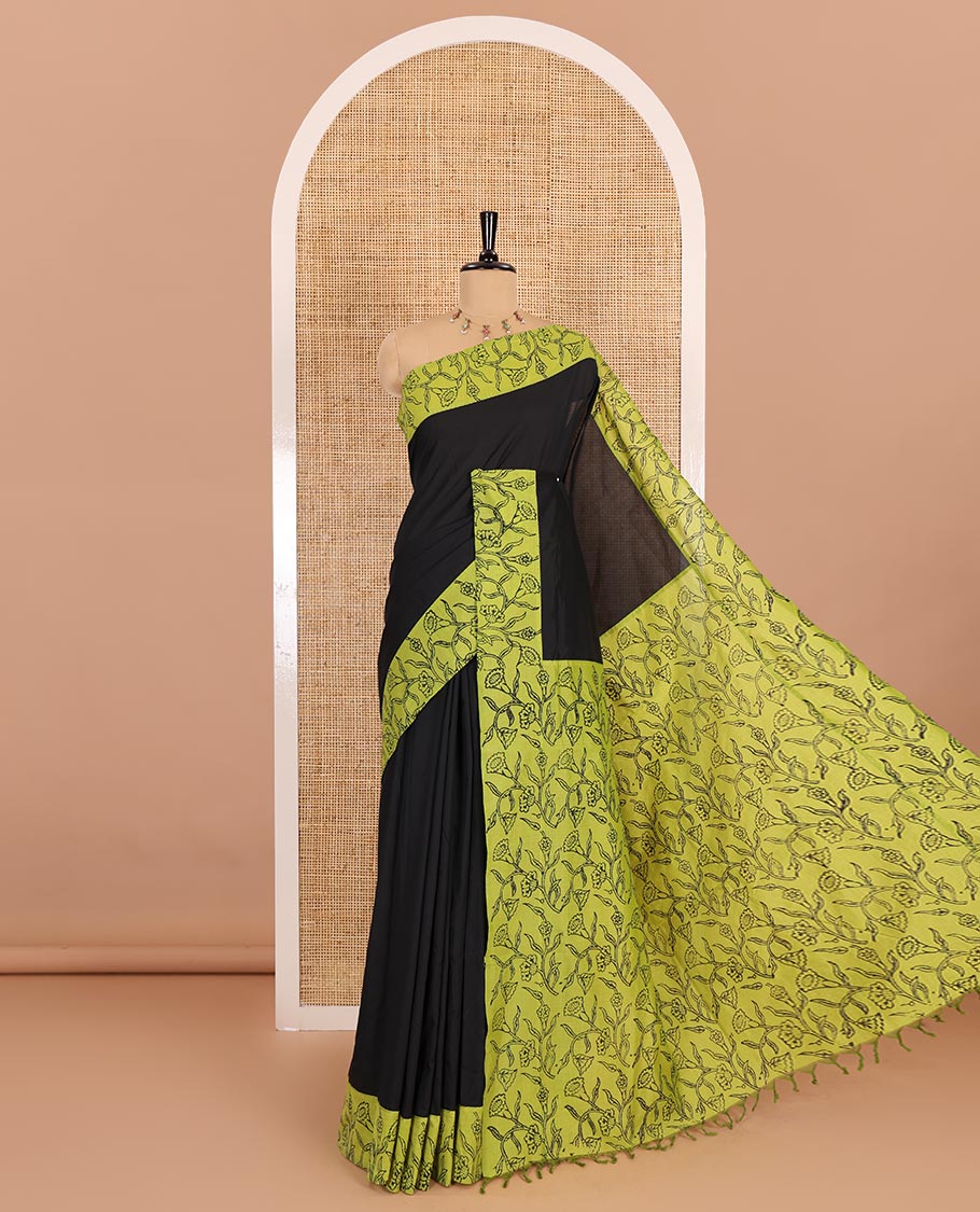 Black plain South cotton saree, contrast block printed border, and pallu of floral vine print, and floral vine printed blouse
