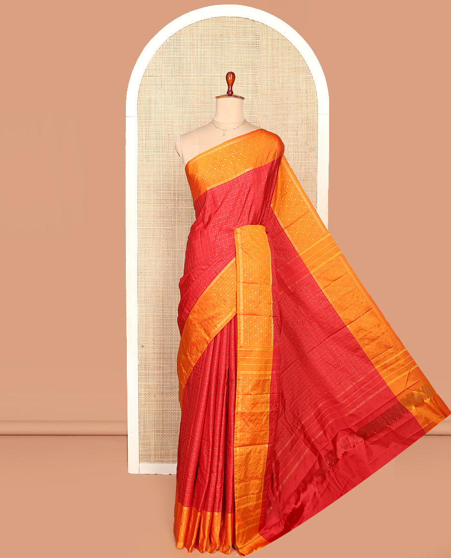 Red Aarani Silk Saree, Elevated with Butta Enclosed Checks, Complemented by a Contrast Butta Enclosed Checked Border, Zari Design Pallu, and Paired with a Matching Blouse