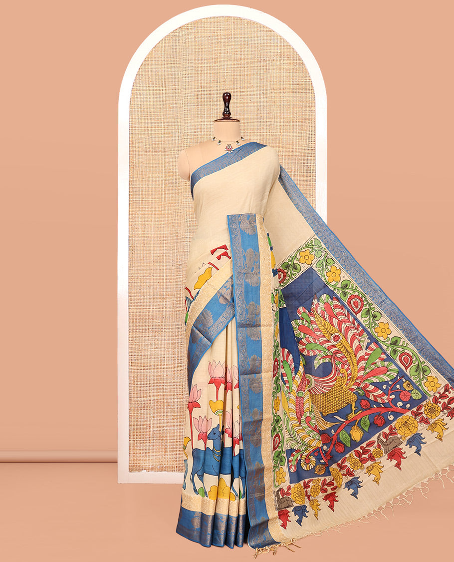 Sandal Kalamkari Printed Semi-Banarasi Tussar Saree, Beautified with Pichwai Cow-Lotus, Contrast Traditional Border, Contrast Peacock Printed Pallu, and a Contrast Blouse