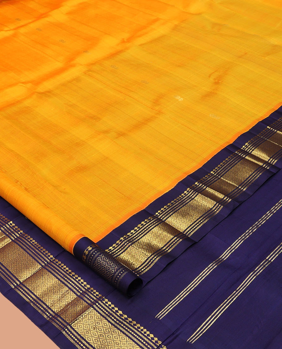 Orange Kanchipuram Silk Saree, Woven with Zari Buttas, Complemented by a Contrast Korvai Border of Panner Sombu, Banaras, Muthu, and Mayil Kann Design, Pallu of Zari Design, and No Blouse