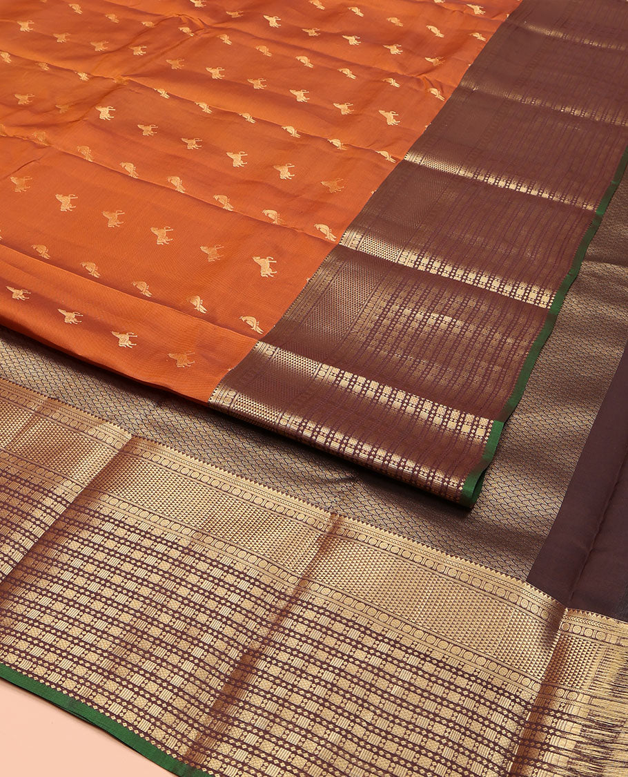 Orange Vasundhara Lite Silk Mix Saree, Graced with Zari Buttas on Its Body, Complemented by a Contrast Border of Rekku, Kathir, Rudraksham, Ara Maadam, and Mayil Kann Designs, Geometric Textured Pallu, and Paired with a Contrast Blouse