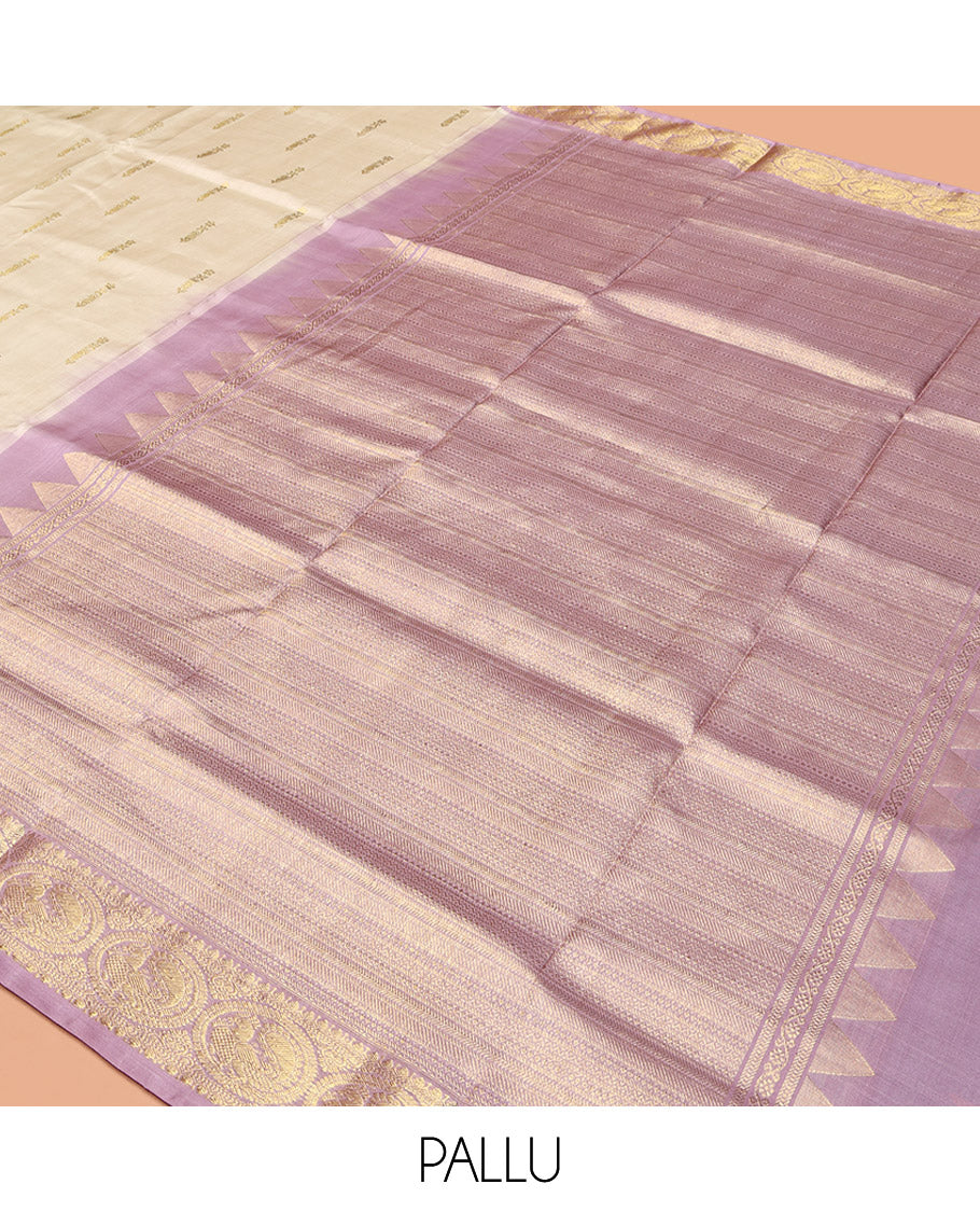Off-White Venkatagiri Silk Saree, Spotlighted with Zari Buttas All Over Its Body, Complemented by a Contrast Traditional Zari Design Border, Grand Pallu, and Paired with a Contrast Blouse