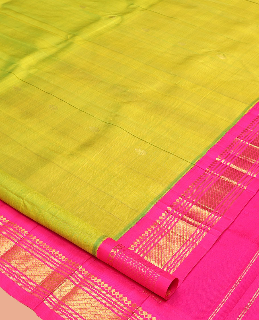 Green Kanchipuram Silk Saree, Woven with Zari Buttas, a Contrast One-Sided Korvai Border of Salngai, and Banaras Designs, a Zari Design Pallu, and No Blouse