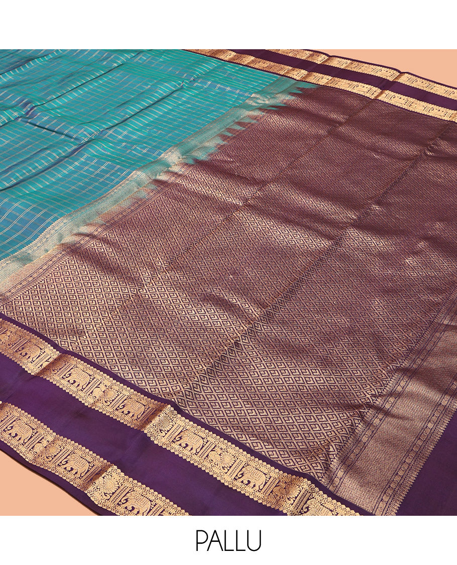 Blue Vasundhara Lite Silk Mix Saree, Spotlighted with Checks, Complemented by a Contrast Rettai Pettu Border of Thilakam Mokku, Yaanai and Mayil Design, Jaal Pallu, and a Contrast Blouse