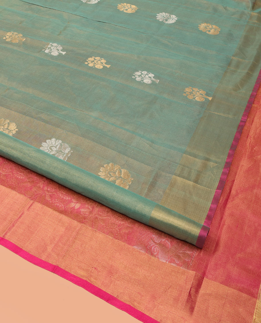 Green Uppada Silk Saree Bedecked with Zari Buttas, Complemented by Bavanji Border, Captivating Contrast Pallu of Floral-Paisley Design Weave, and Paired with a Contrast Blouse