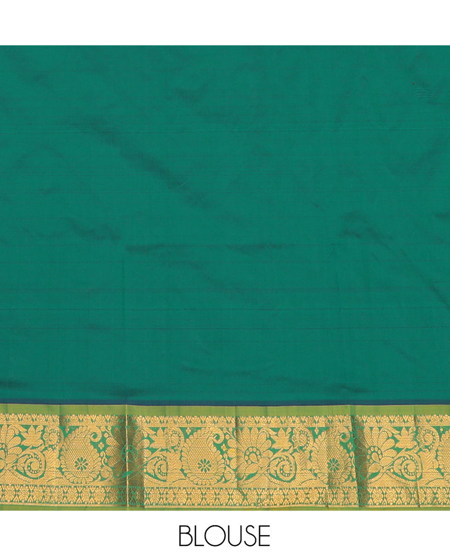 Green Art Silk Pavadai Material Set, Decorated with Zari Designs on Its Skirt, Complemented by a Contrast Paisley Zari Border, and a Matching Blouse