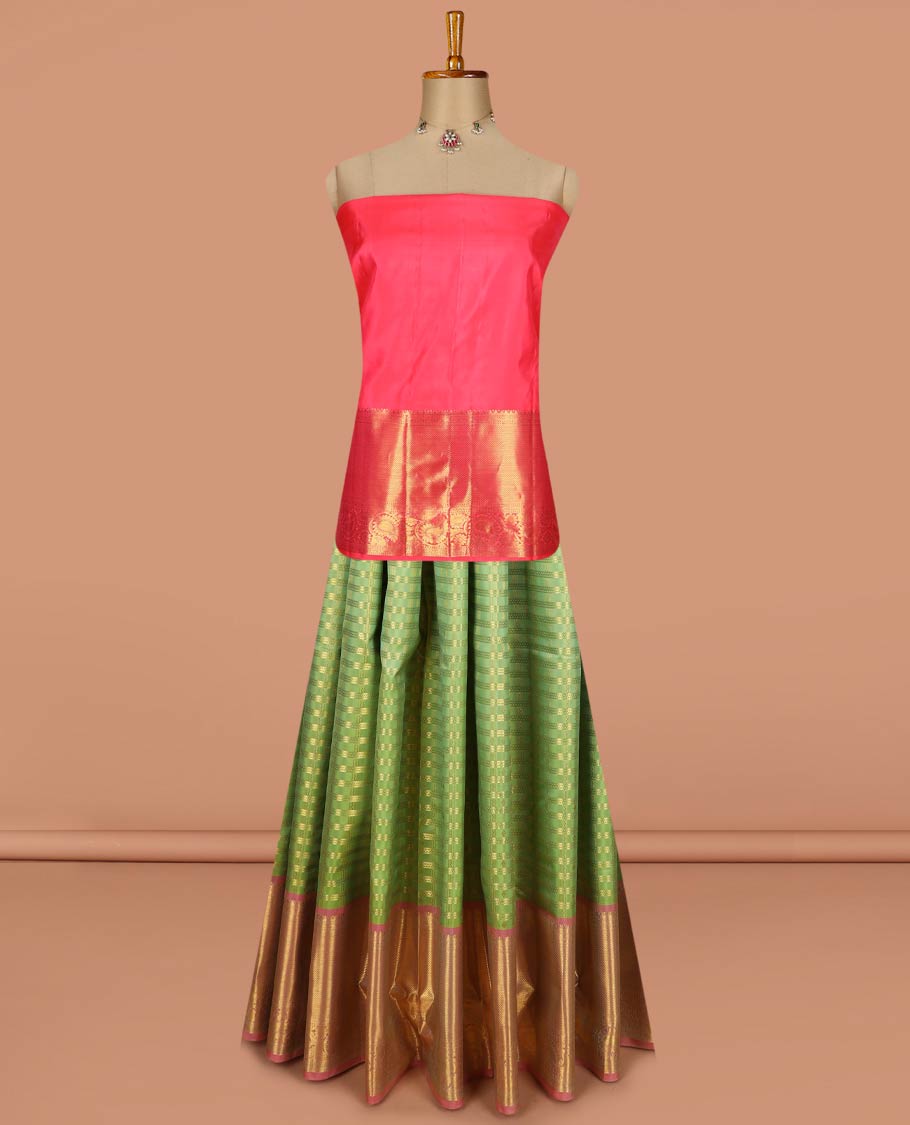 Green pure-silk half-saree, zari buttas and checked skirt, contrast kuyil kann and kodi manga border, zari design blouse, and a intricate zari woven dhavani