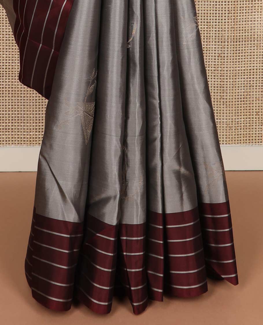 Grey zari buttas silk mix saree, contrast striped border & pallu of floral designs